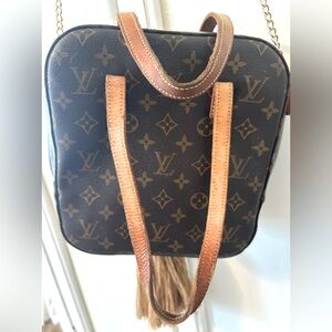 Authentic LV  cosmetic luggage piece or doubles as a purse..